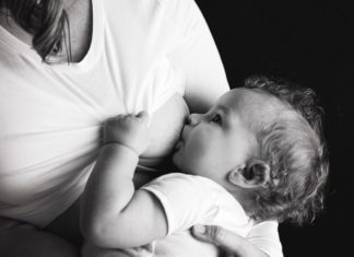 mother nursing infant Providence Moms Blog