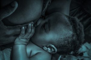 mother breastfeeding child Providence Moms Blog