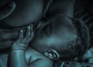 mother nursing baby Providence Moms Blog