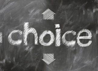 chalkboard sign that says "choice" with arrows pointing up, down, and sideways Providence Moms Blog