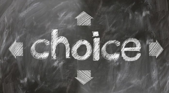 chalkboard sign that says "choice" with arrows pointing up, down, and sideways Providence Moms Blog
