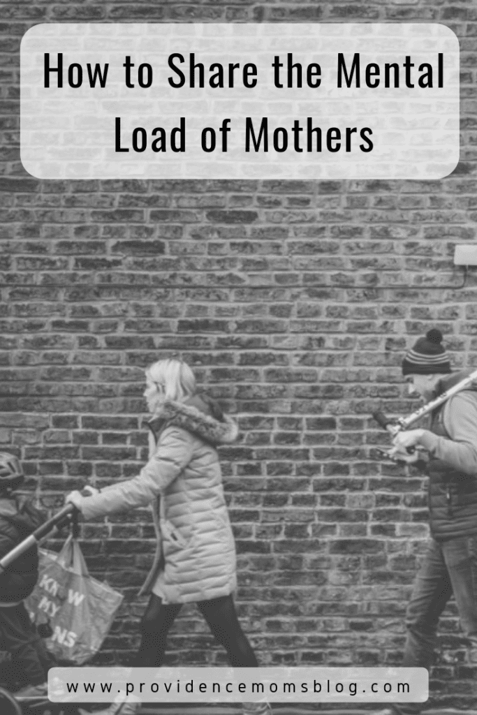 Mental Load of Mothers - Image of Mother pushing stroller followed by Father looking down