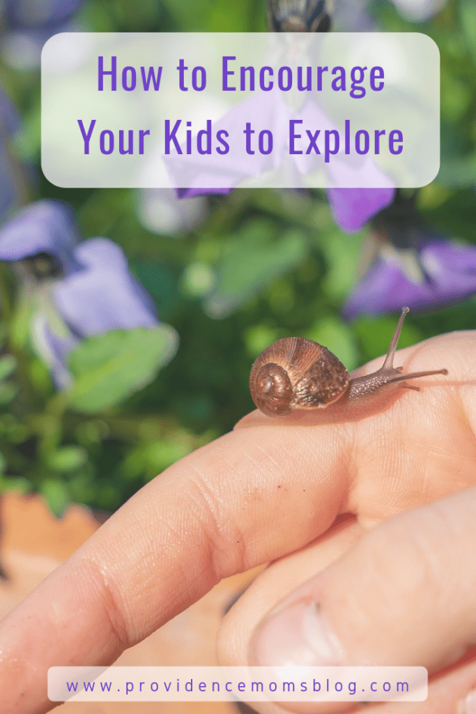 Encouraging Kids to Explore written with picture of a hand and snail in the background. Words www.providencemomsblog.com