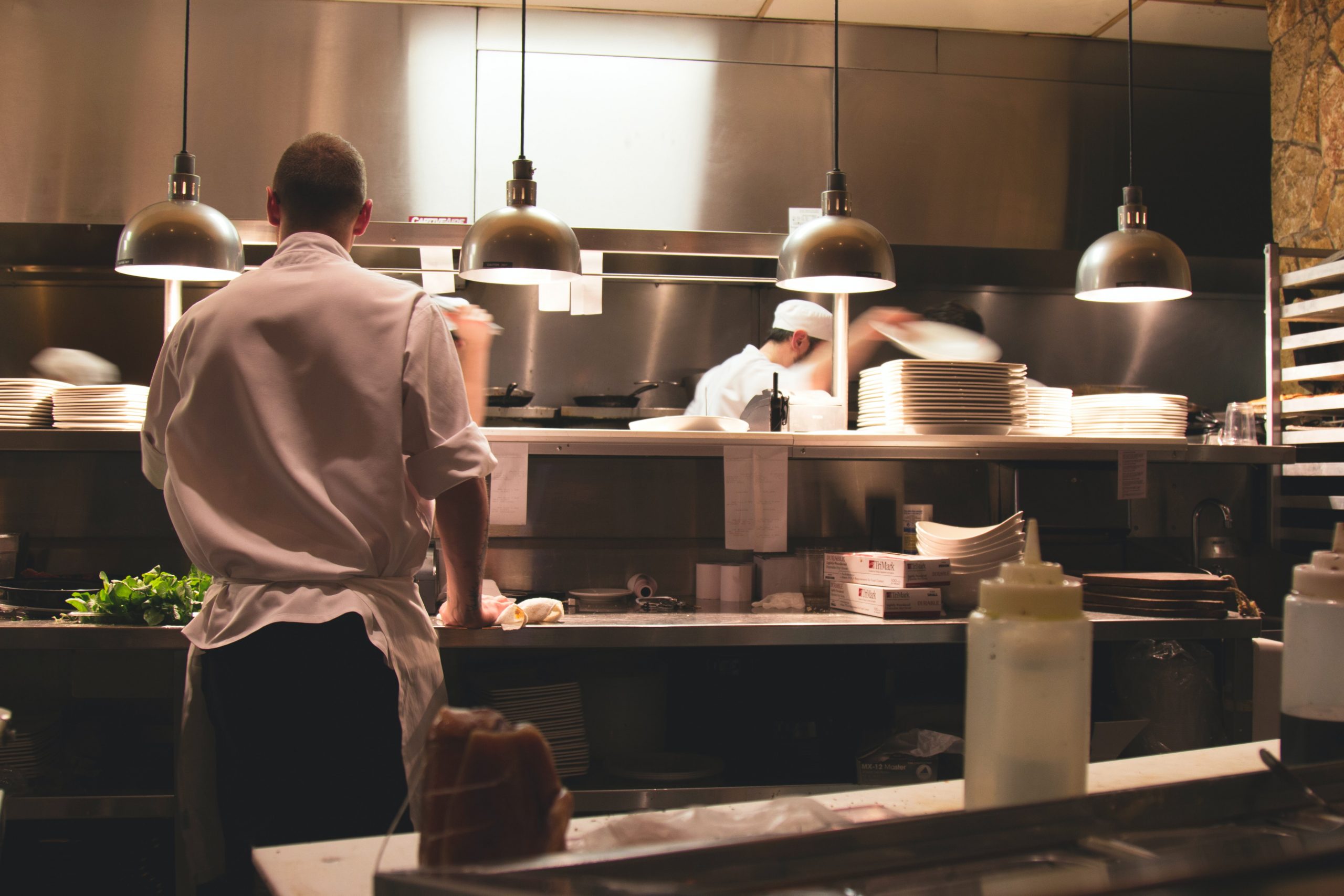 Workers in a restaurant kitchen 