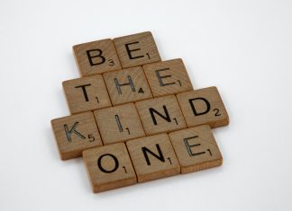 Game tiles reading "BE THE KIND ONE"