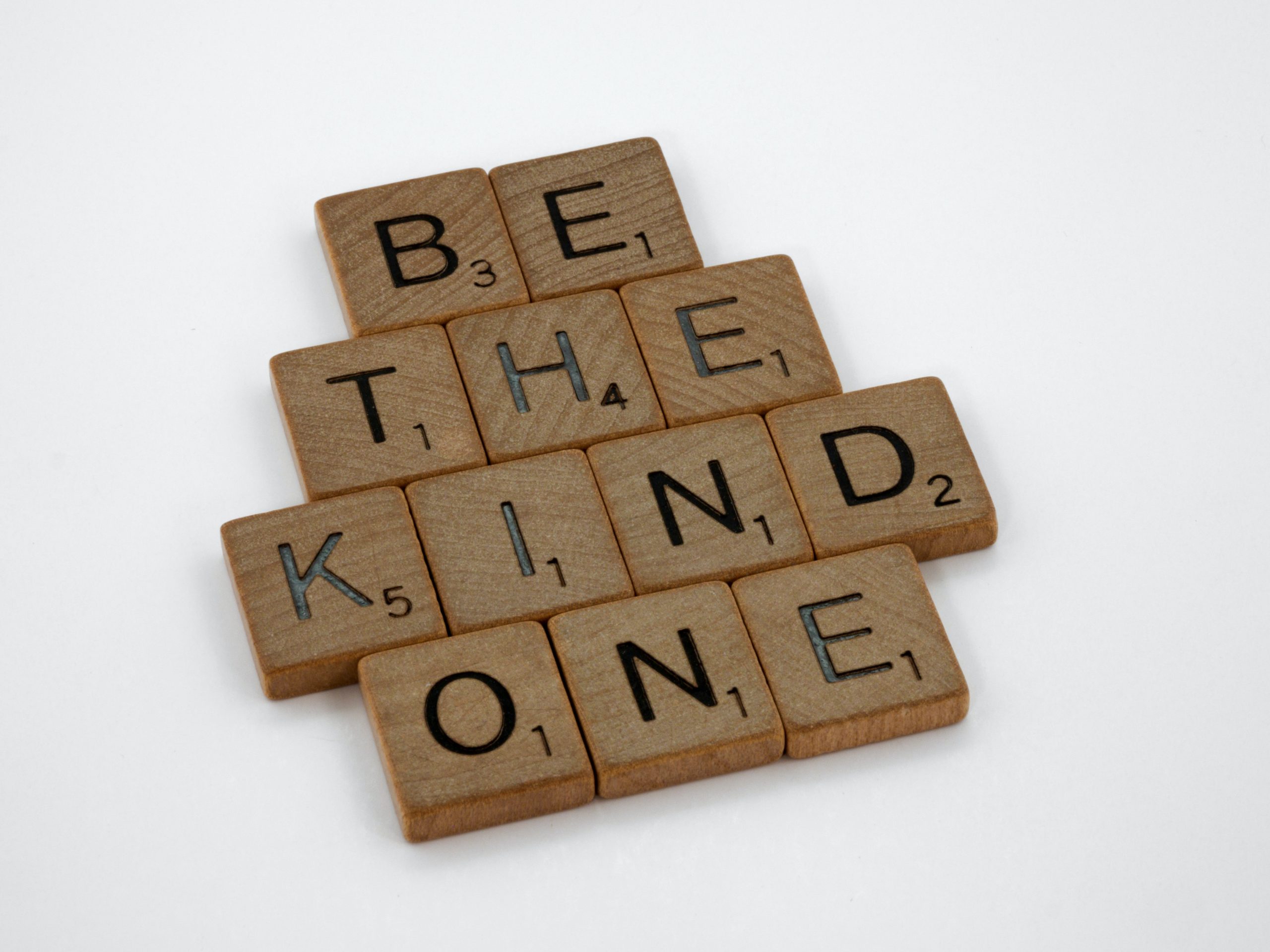 Game tiles reading "BE THE KIND ONE"